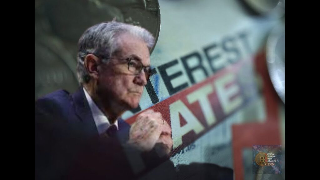 Federal Reserve Chair Jerome Powell Warns of Higher Interest Rates and Tighter Policy